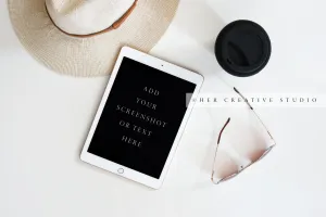 Panama Hat, Tablet with Sunglasses. Styled Image.